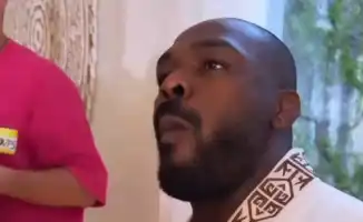 Джон Джонс попробовал бешбармак и примерил казахскую одежду